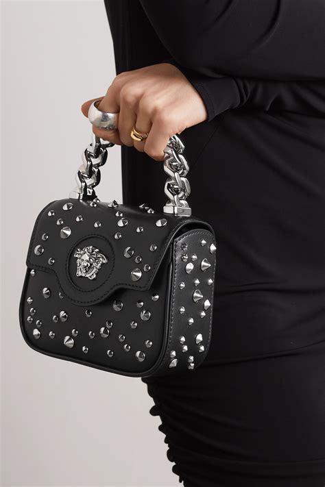 versace small icon shoulder bag|Versace embellished leather shoulder bag.